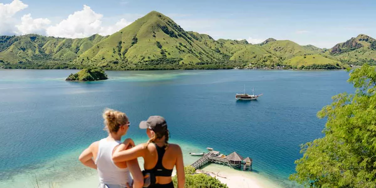 Wome Looking Over Water In Komodo