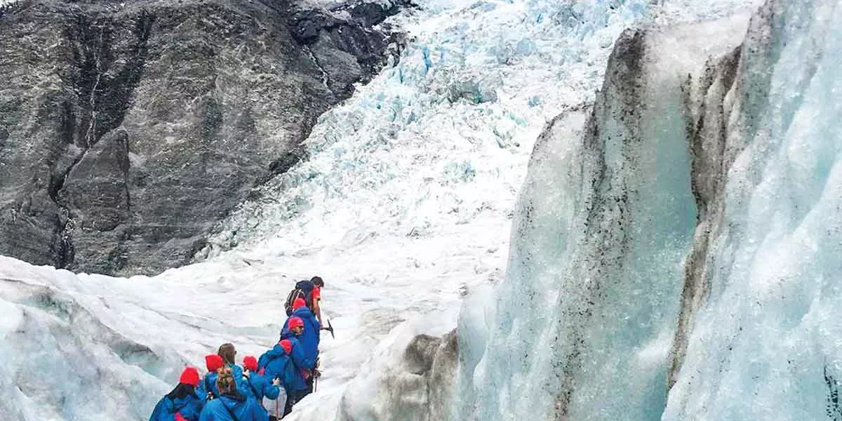 Travellers In Icey Climate New Zealand