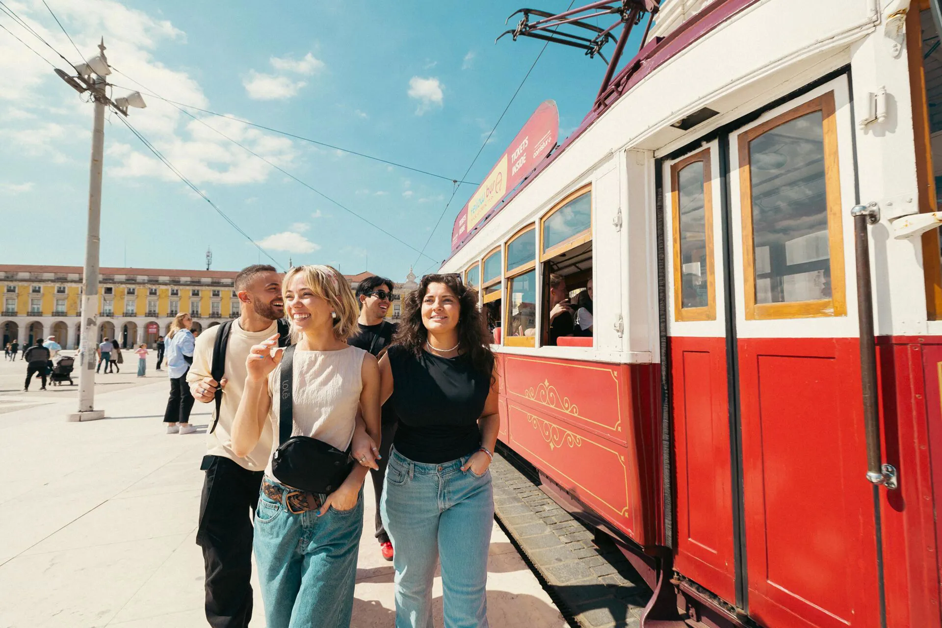 Friends Walking Portugal Train Next To Them