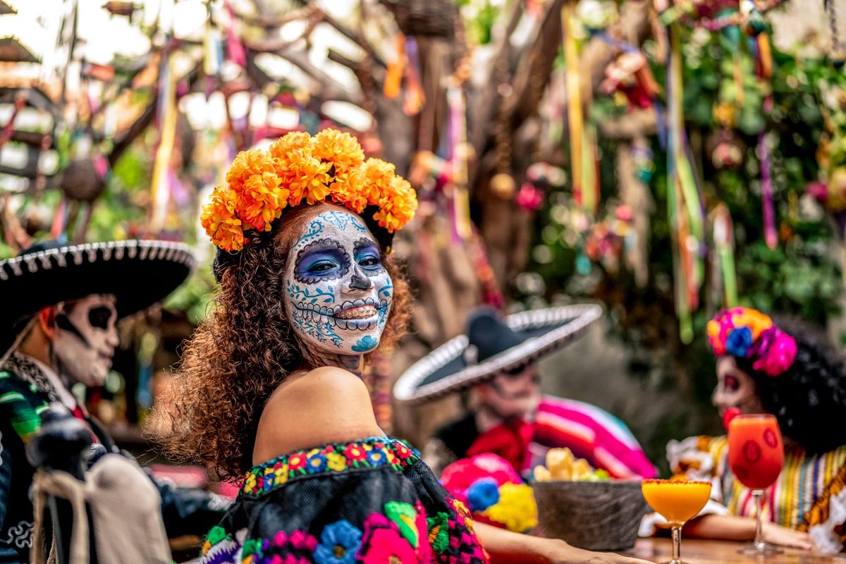 Woman Smiling With Traditional Makeup For The Celebration in Mexico