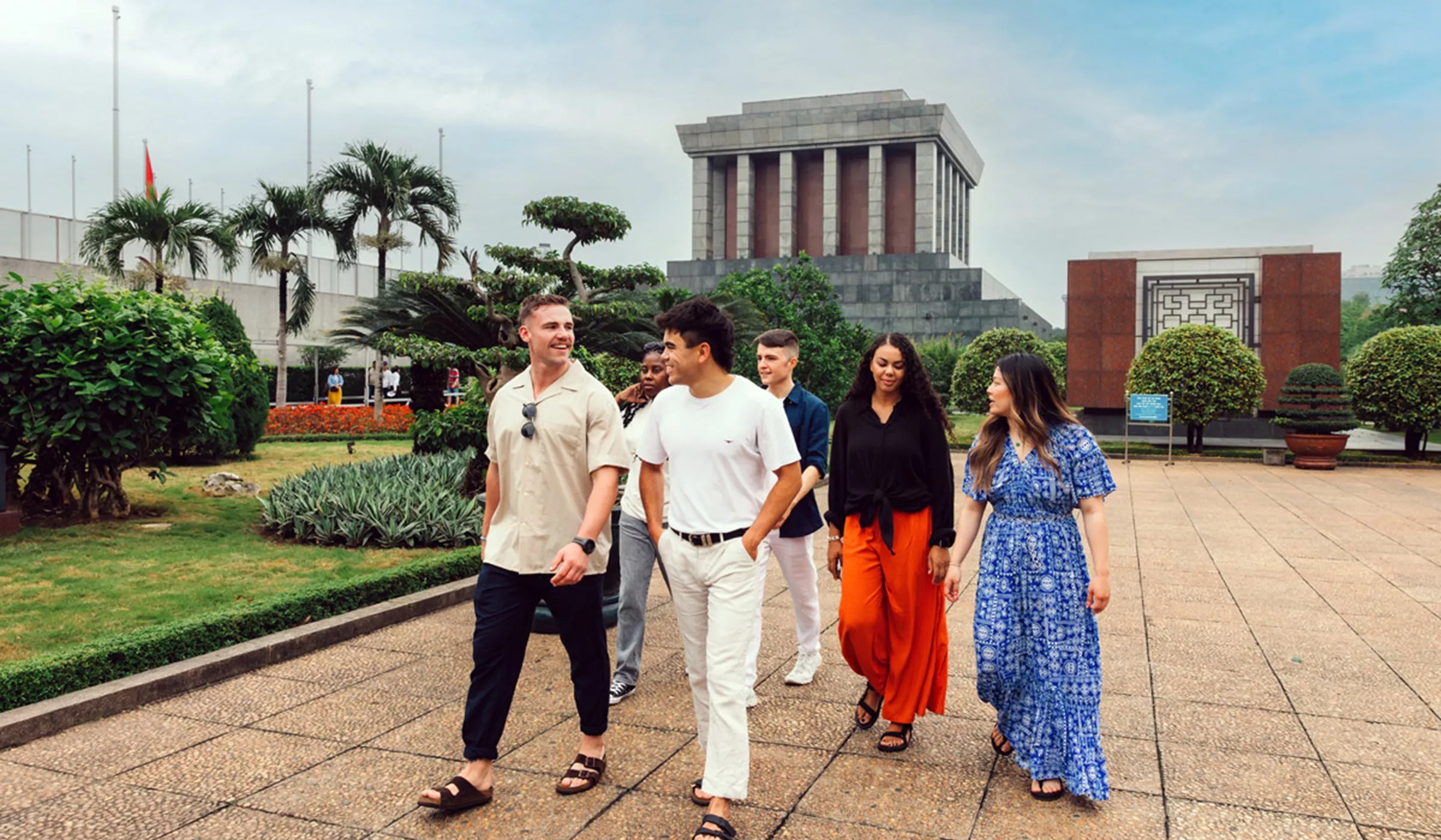 Group Walking Through Ho Chi Minh