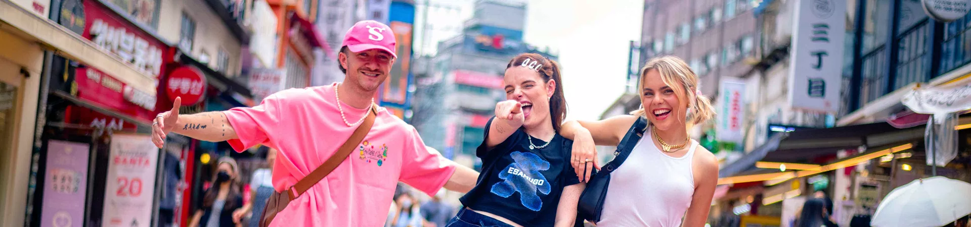 Group Of Friends In The Colourful Streets Of South Korea