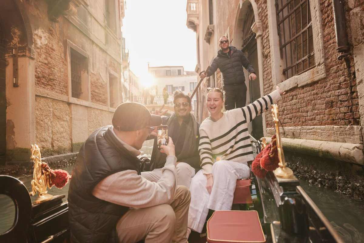 Group Of Friends Enjoying A Boat Ride Italy