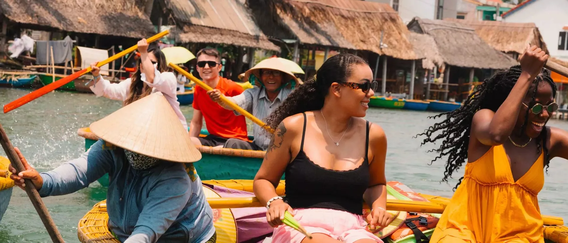 vietnam2024_friends-smiling-having-fun-on-boat.jpg