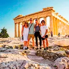 Travellers in front of the Acropolis in Athens, Greece