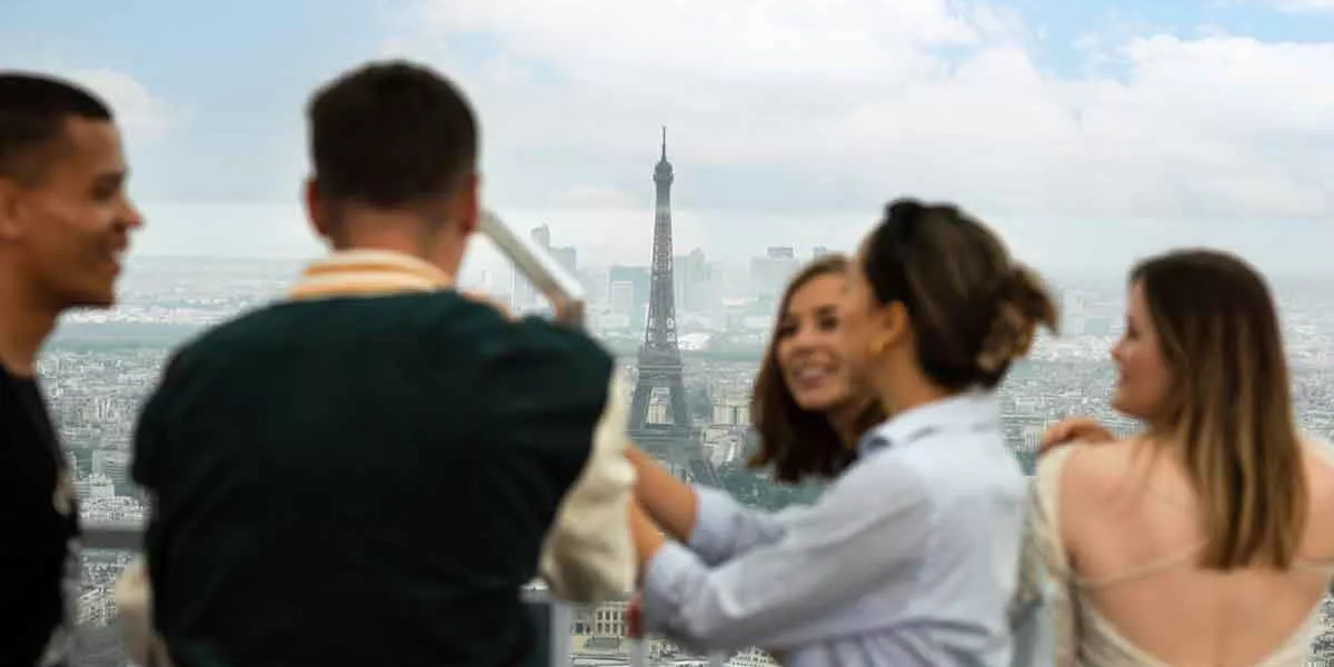 Travellers Enjoying A Scenic View Of The Eiffel Tower Paris France 2