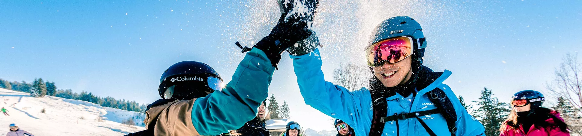 Hi Fiving Skiers Austria