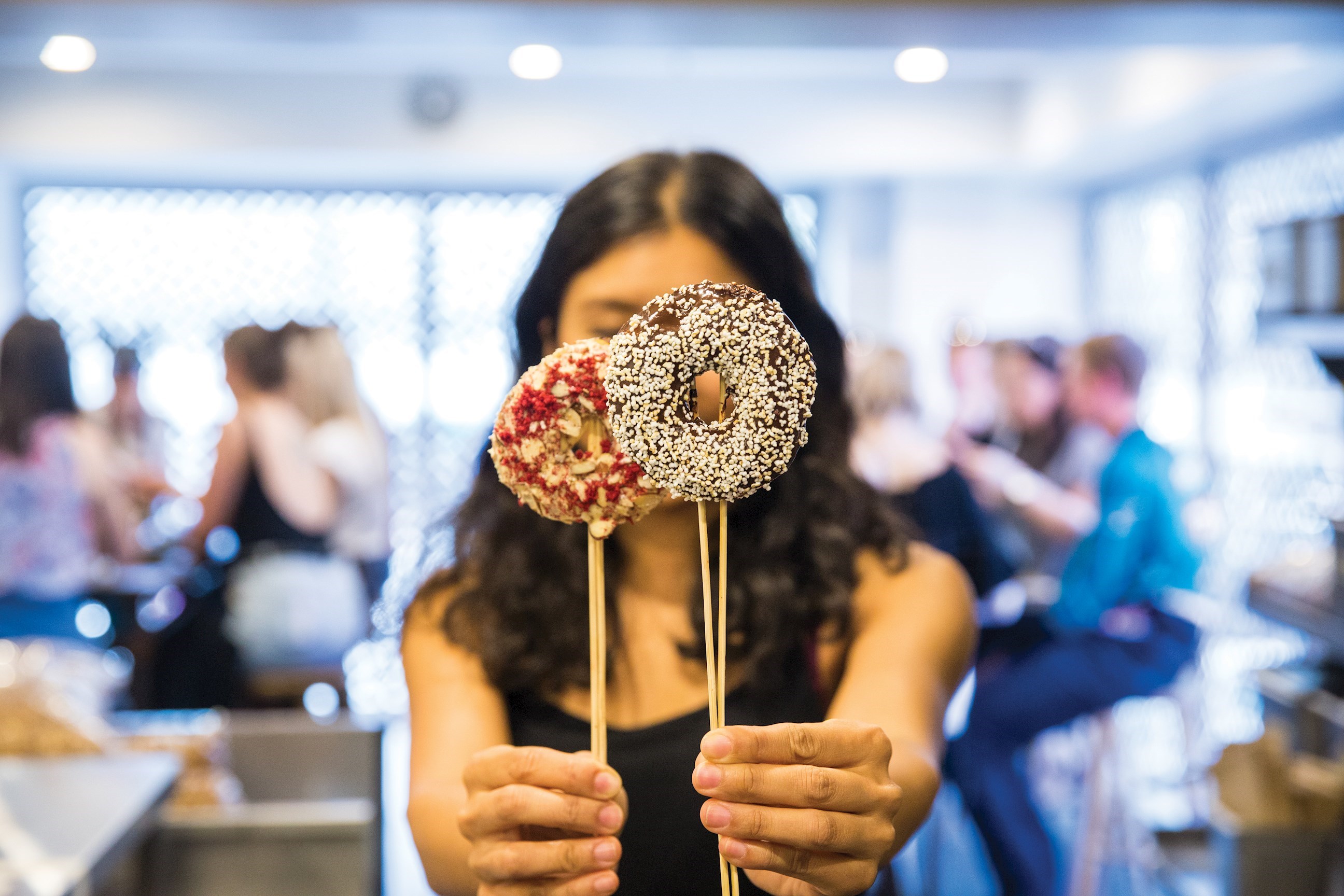 Traveller with sweet treats at a Chefs Table experience in Auckland, New Zealand