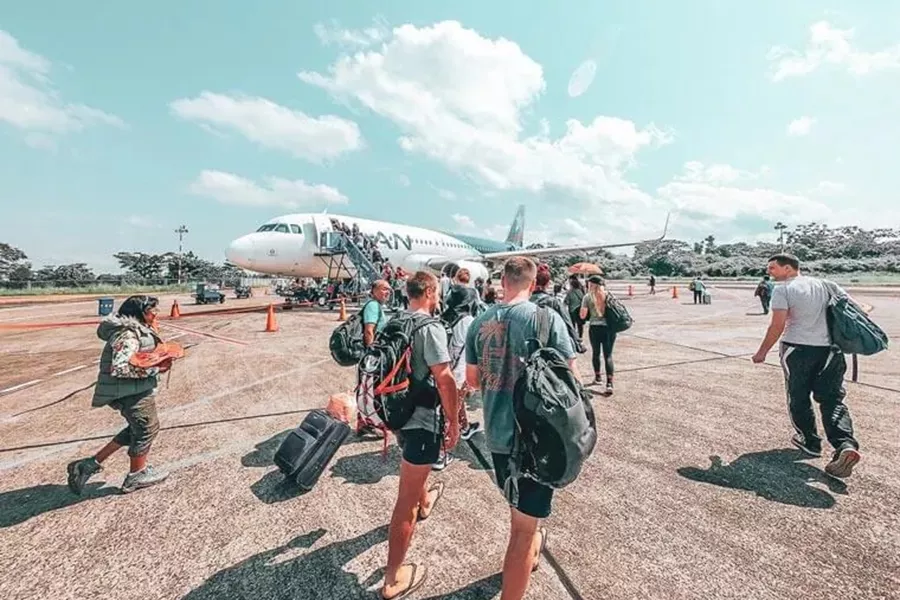 Travellers boarding the plane