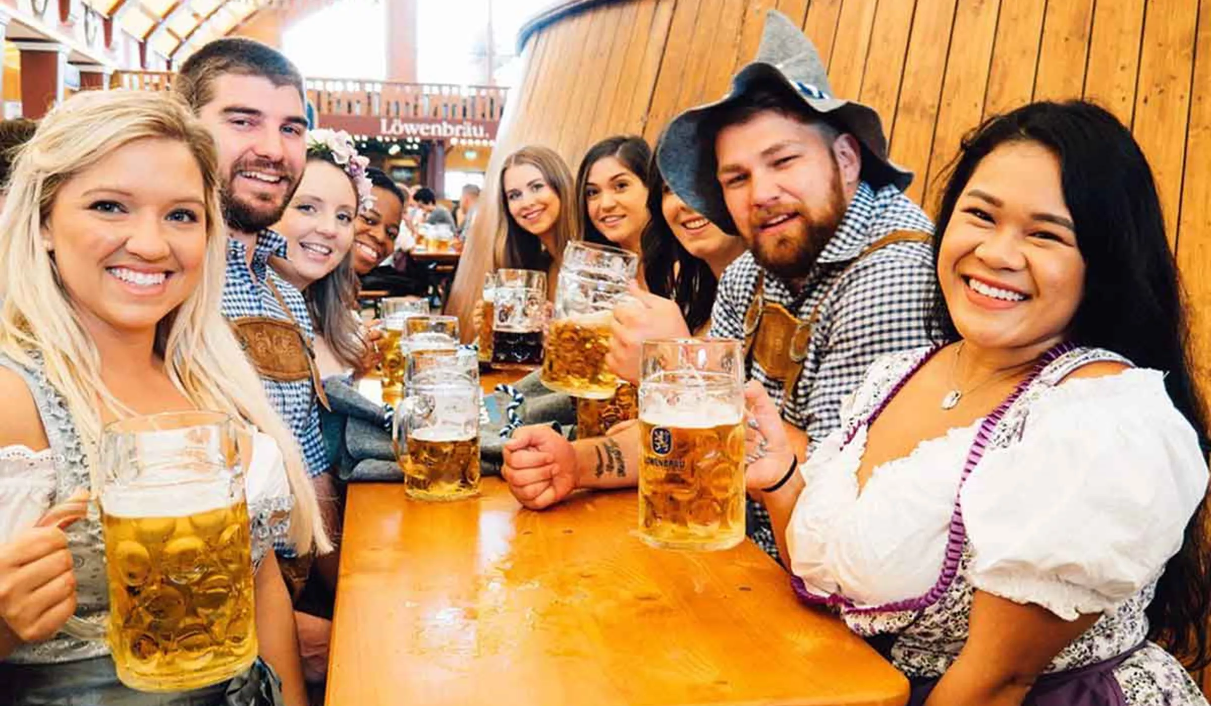 Group of happy people having beer in Germany
