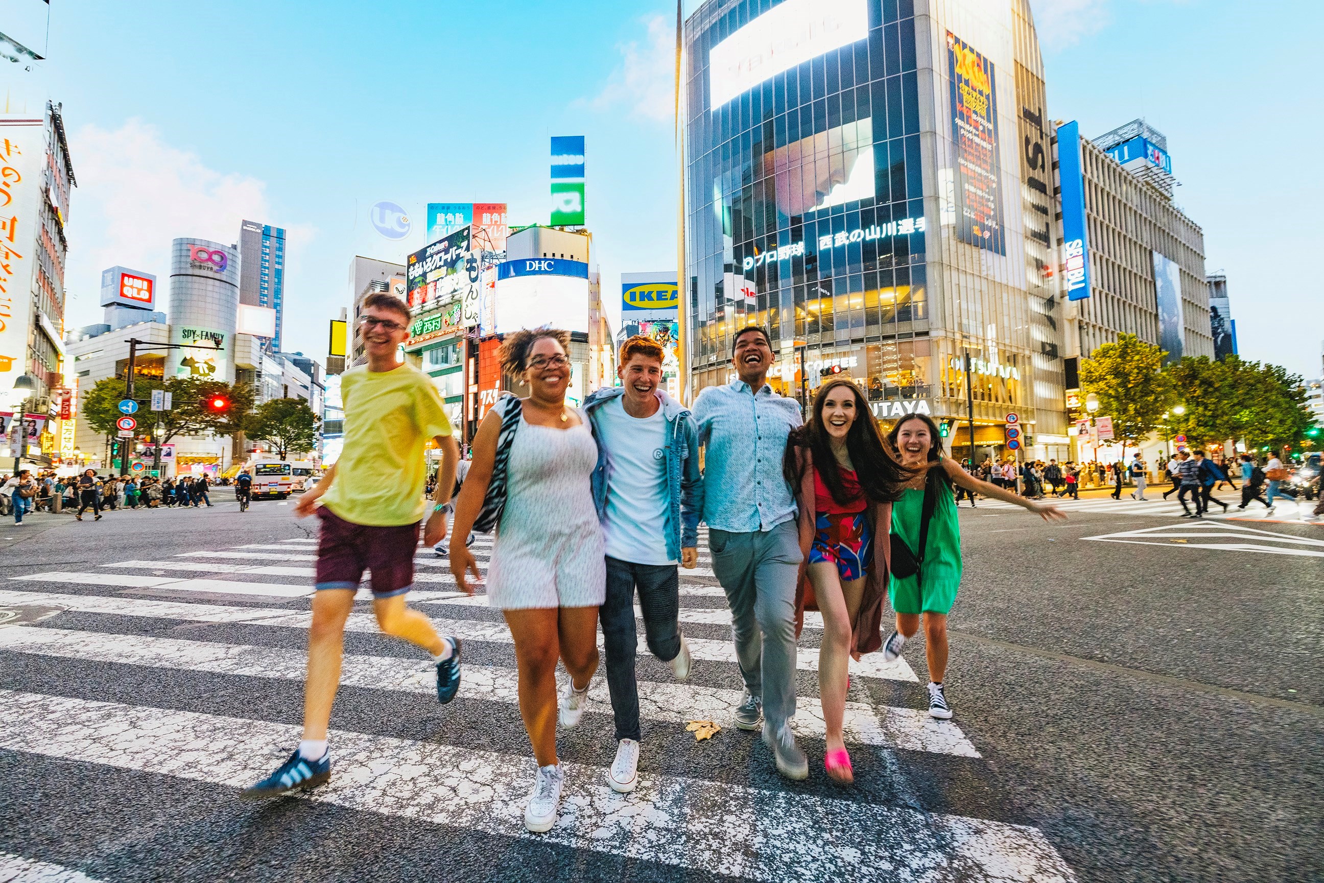 Walk across the iconic Shibuya Scramble Crossing