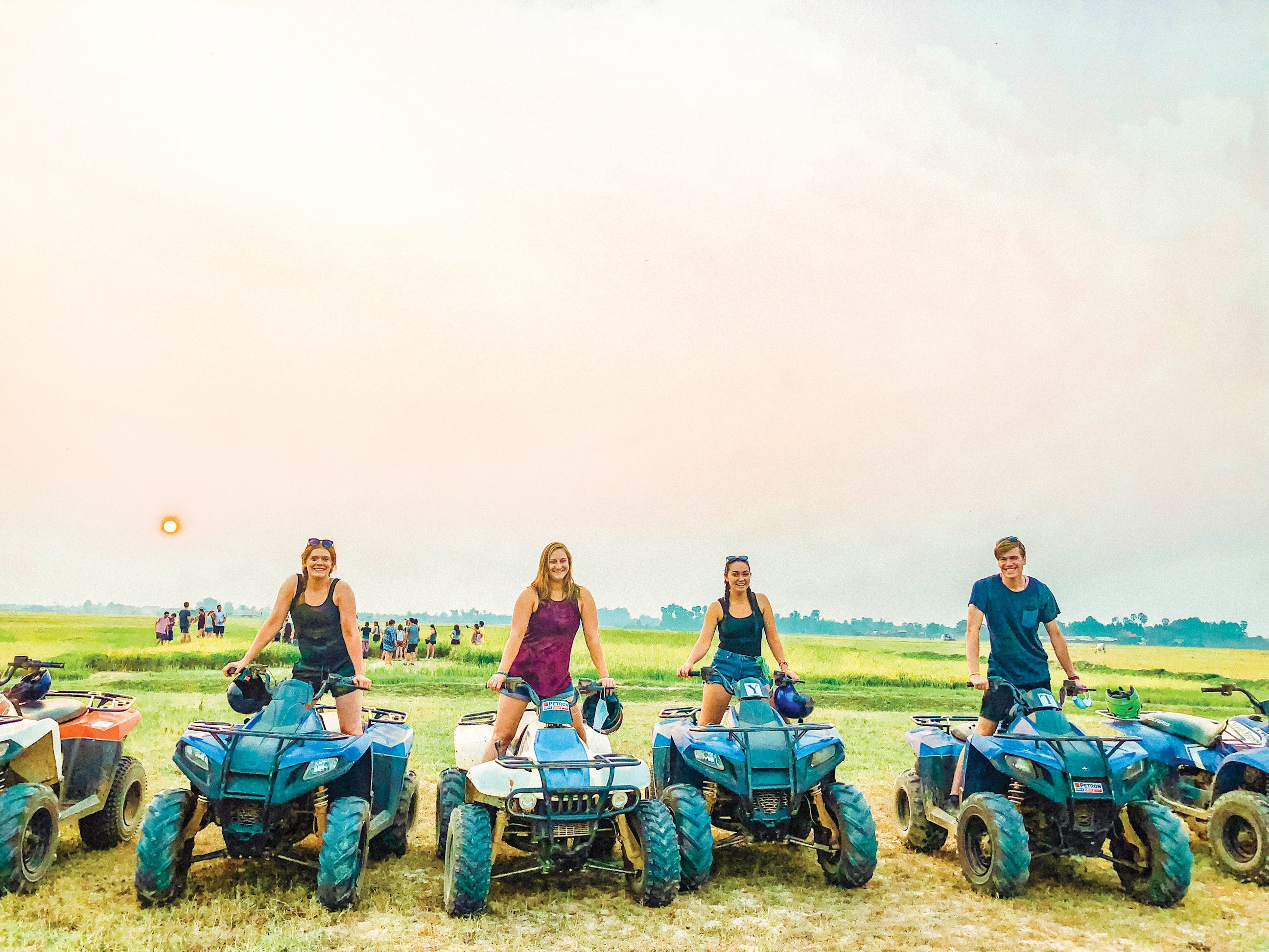 Travellers on quad bikes in Siemp Reap, Cambodia