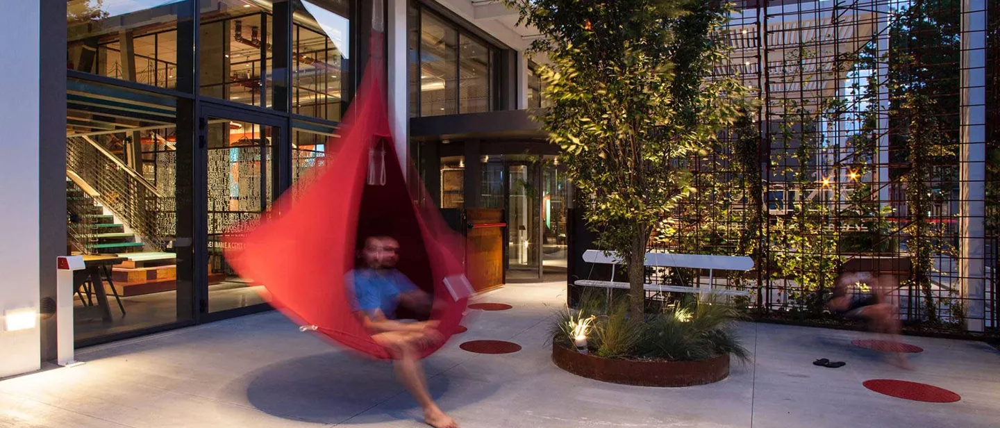 A man swinging in a hammock