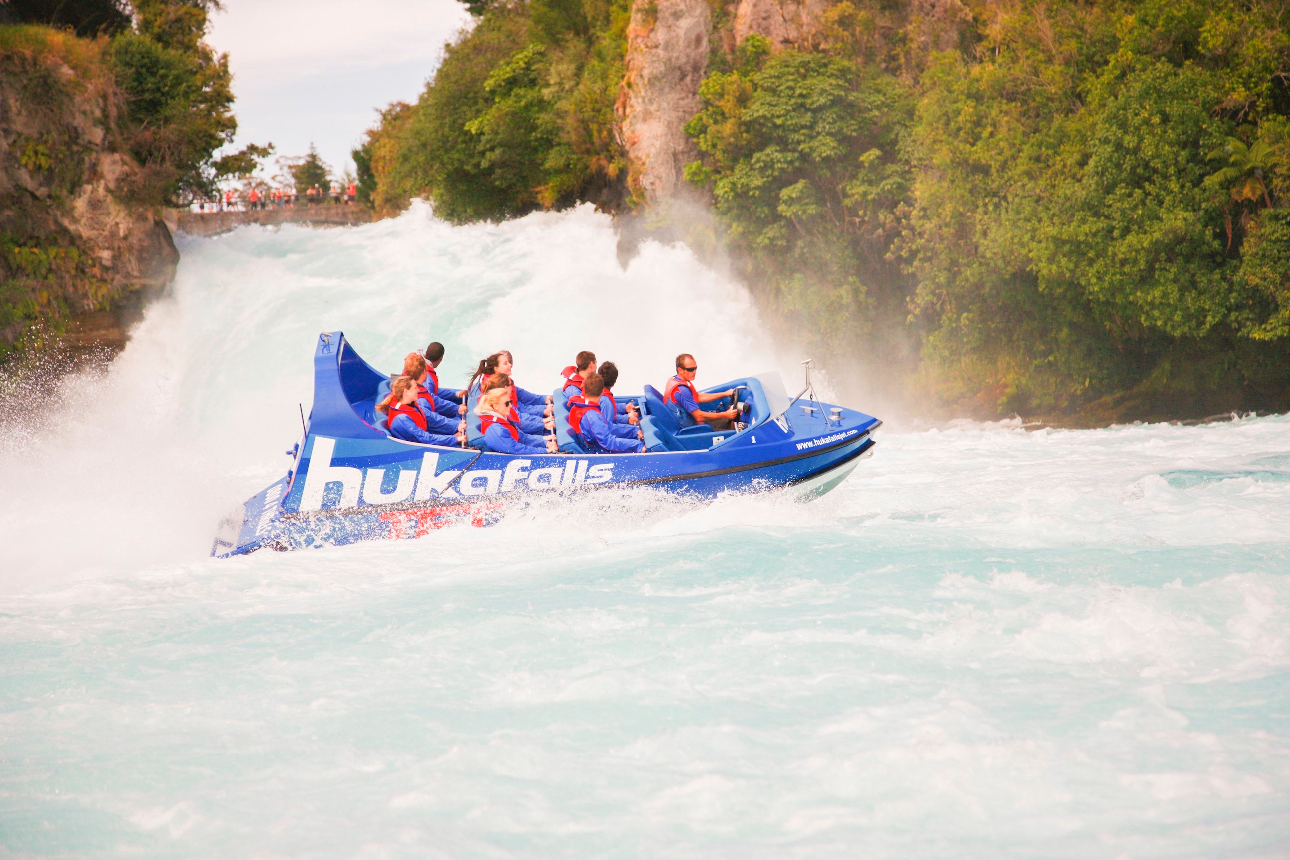 Travellers on a jet boat in Taupo, New Zealand