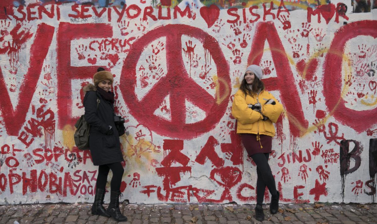 Women Smiling Street Art As Background