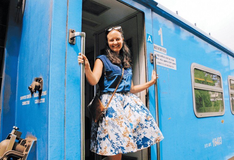 Woman on a train in Sri Lanka