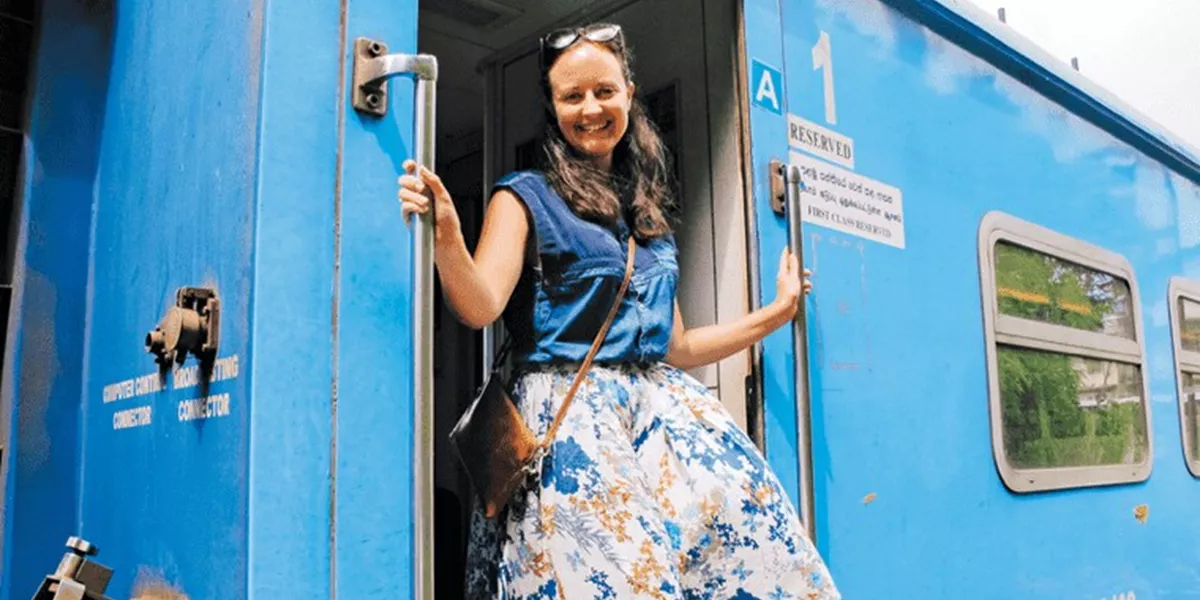 Woman on a train in Sri Lanka