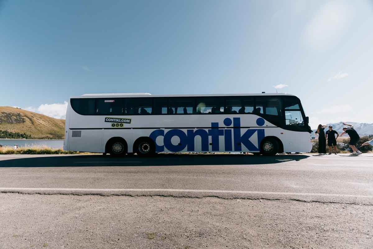 Lake Pukaki Shot Of Contiki Bus New Zealand