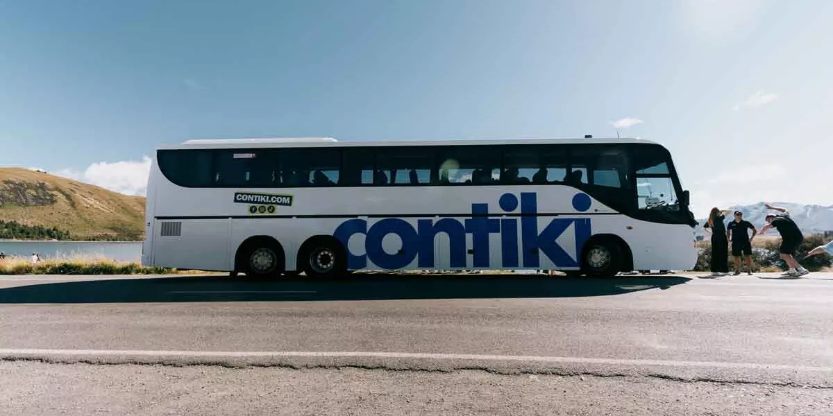 Lake Pukaki Shot Of Contiki Bus New Zealand