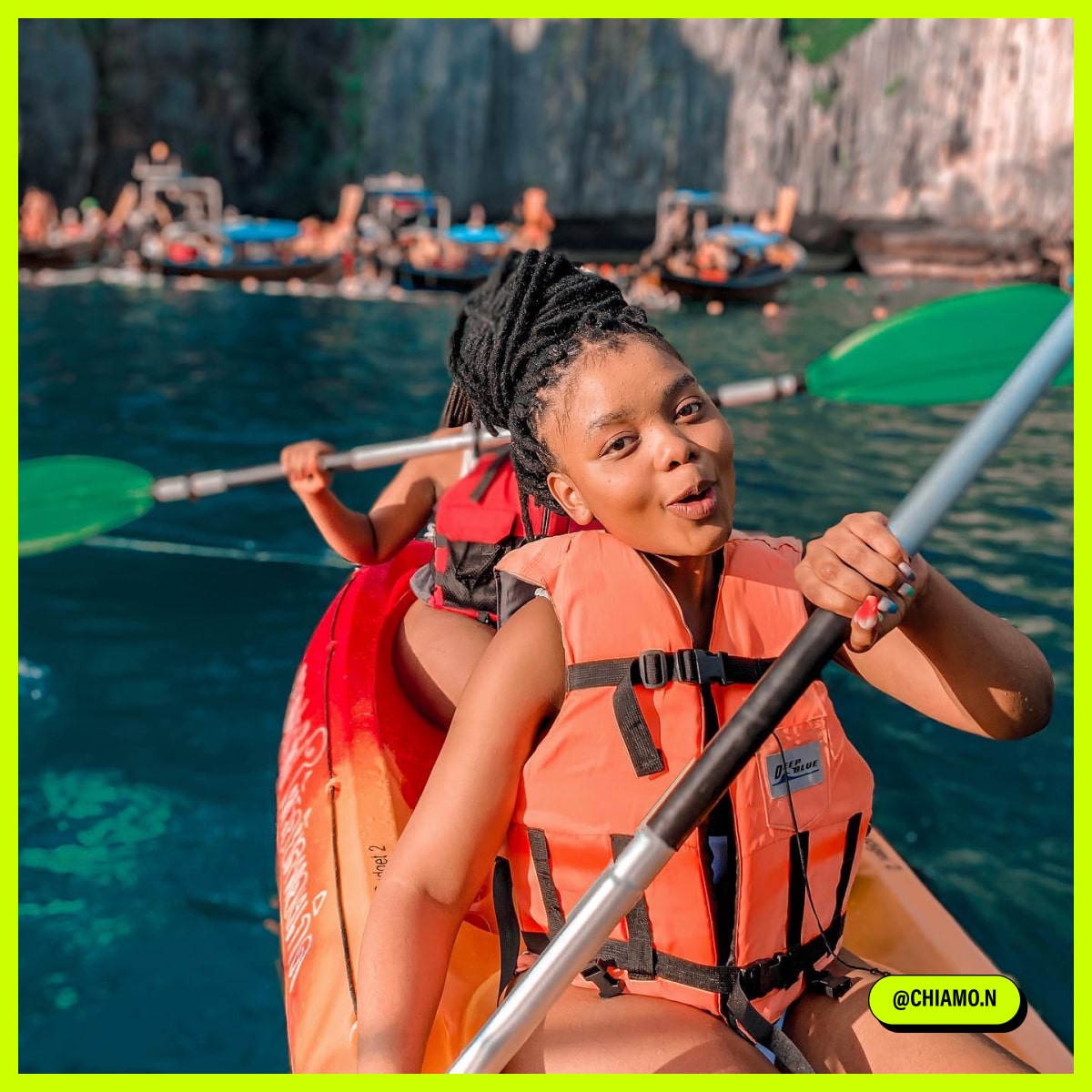 Girls kayaking on the background of others and mountains