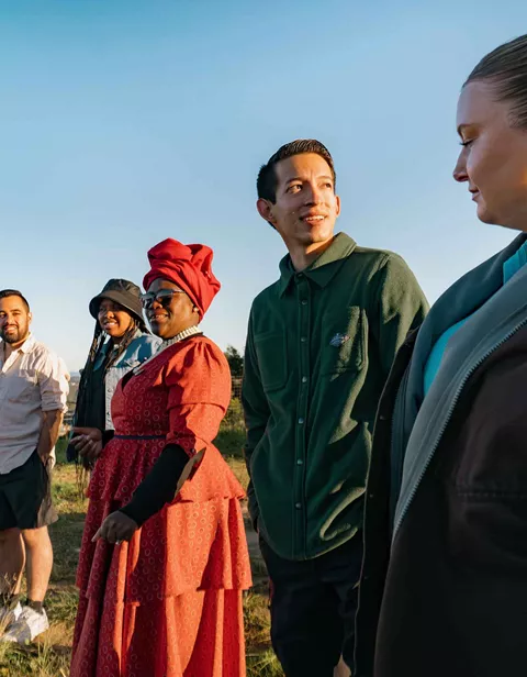 Group Of Contiki Travelers In Township South Africa