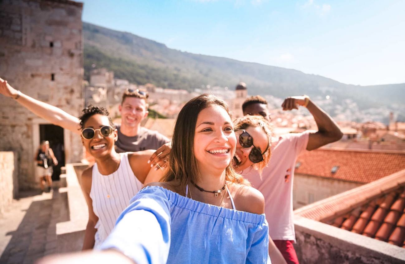 Young woman doing the Canyon Swing in Queensland, New Zealand.