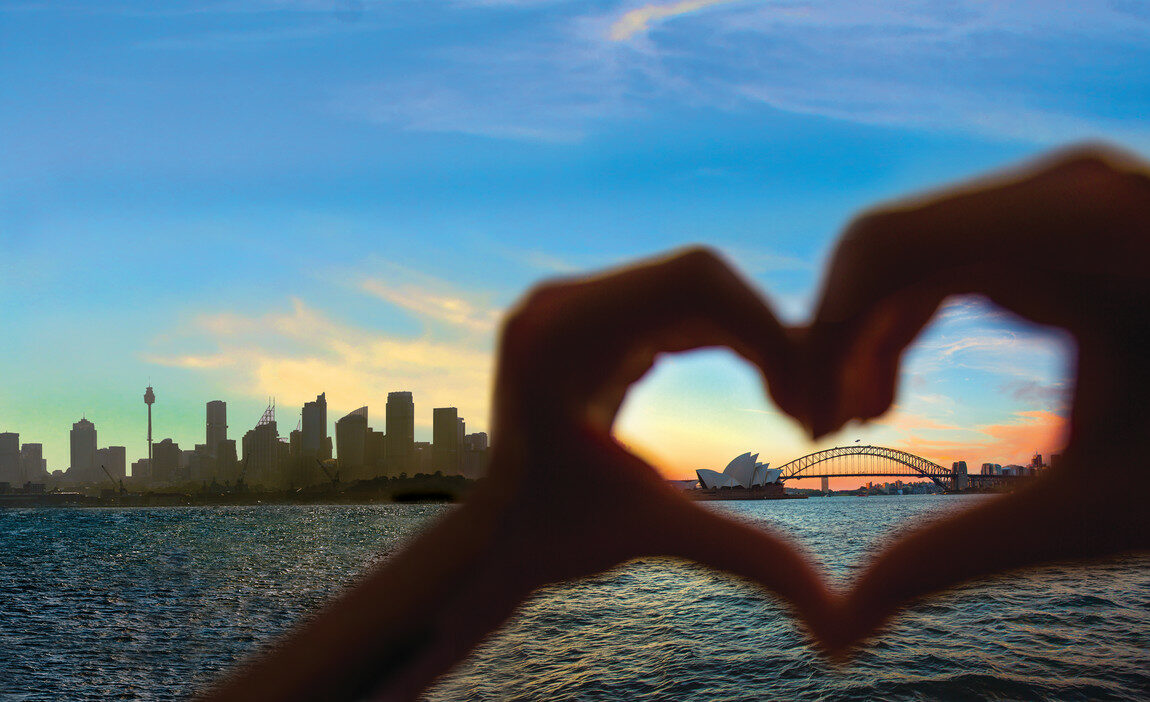 Sydney harbor bridge and Sydney city skyline forming a heart.