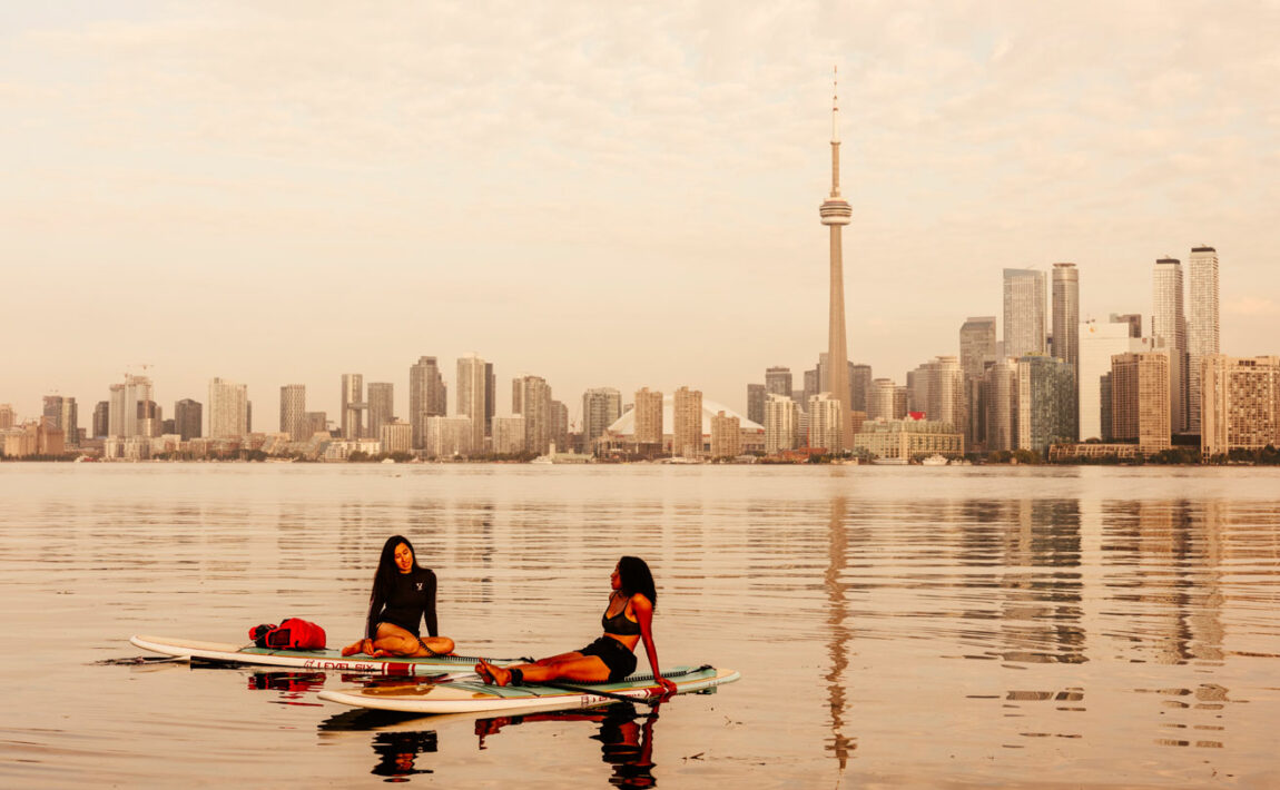 Best things to do in Toronto - girls paddle boarding