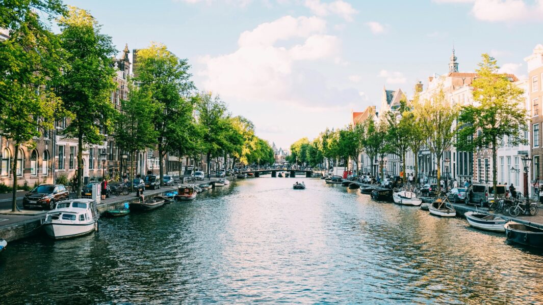 Amsterdam canal in the spring time with bright sunny days