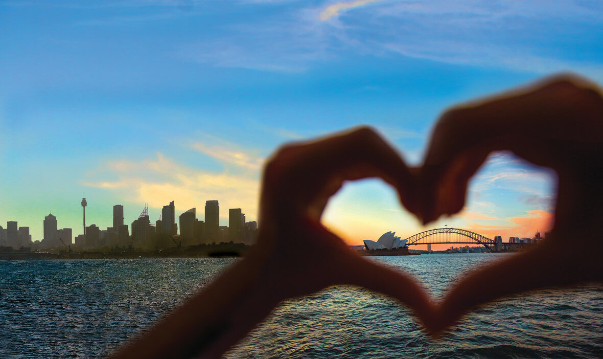 Sydney harbour bridge and sydney city skyline forming a heart on Anzac Day.