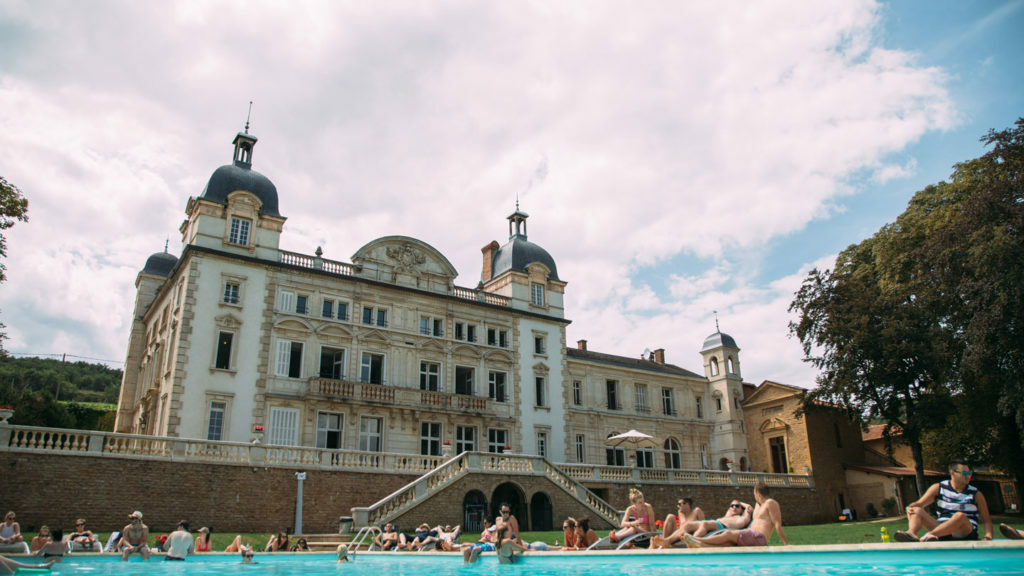 A Contiki Special Stays with a pool in front of it.