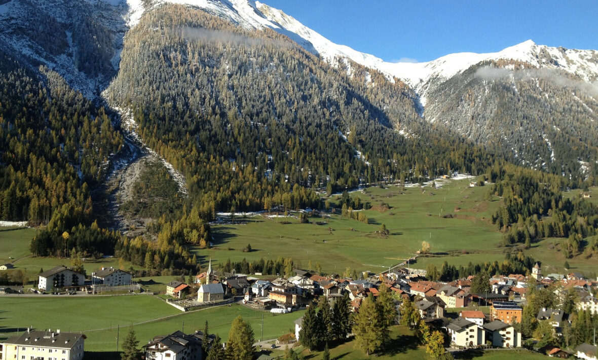 An Instagrammable aerial view of a village in the mountains.