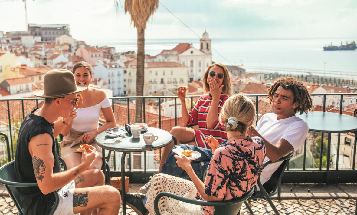 Group of friends eating in Portugal