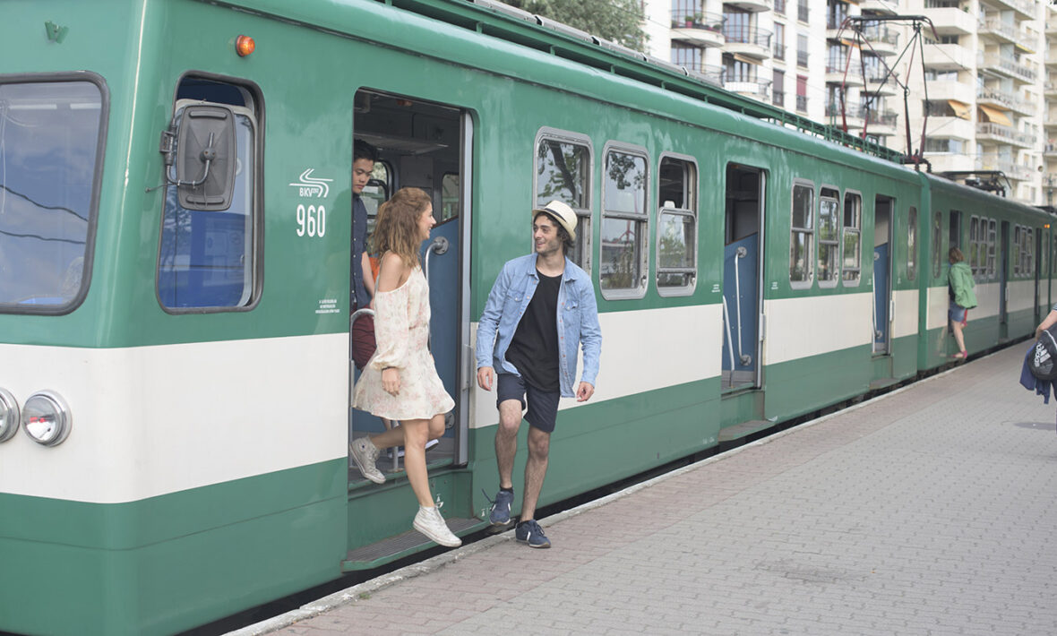 Friends-coming-off-Budapest-public-transport