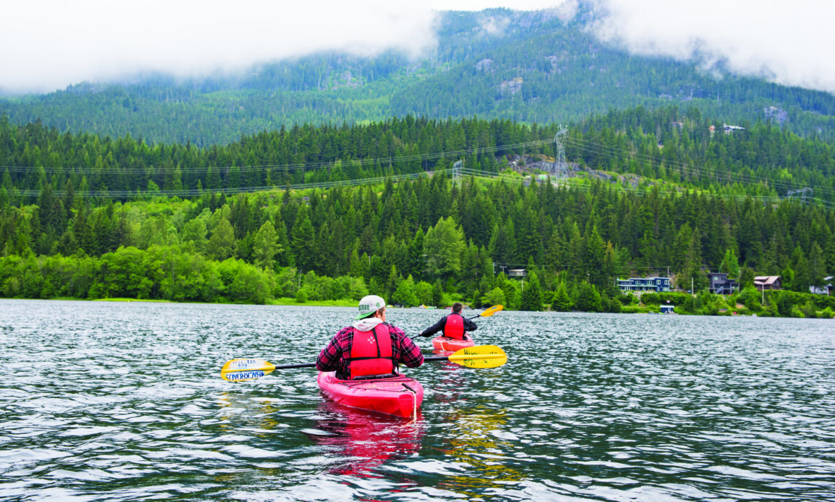 kayaking on lake in canada