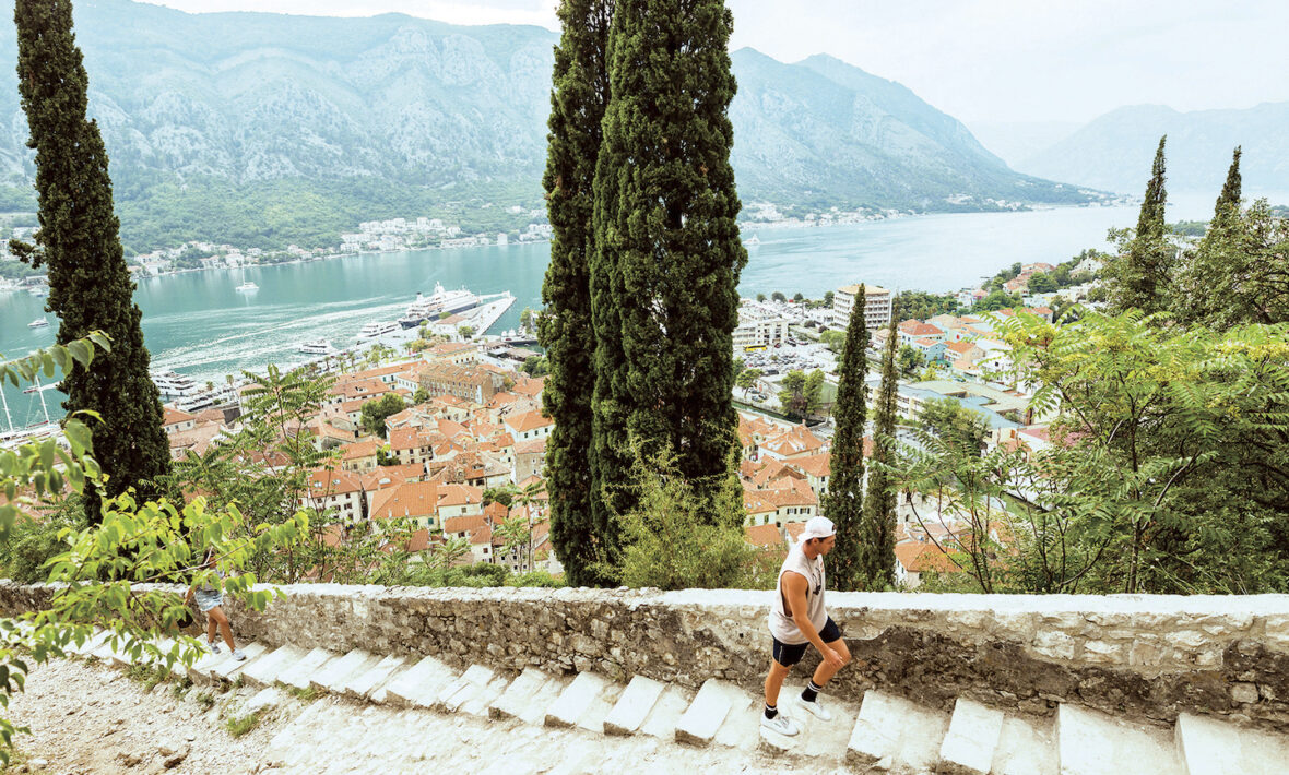 Man climbing stairs in Europe