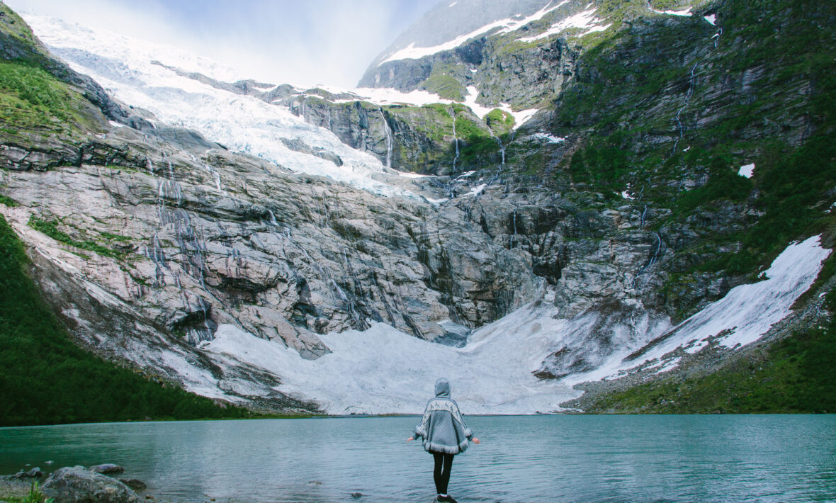 Figure in front of glacier