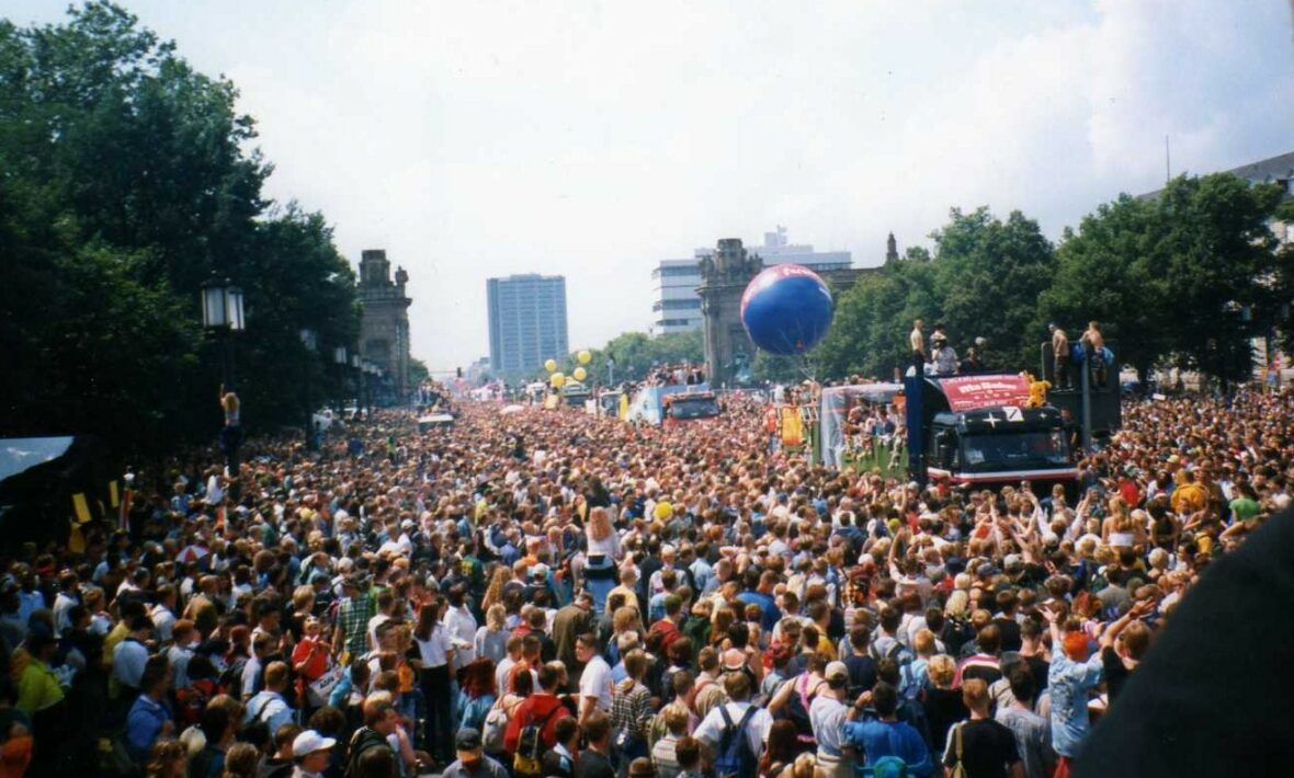 A large crowd of people on a street.