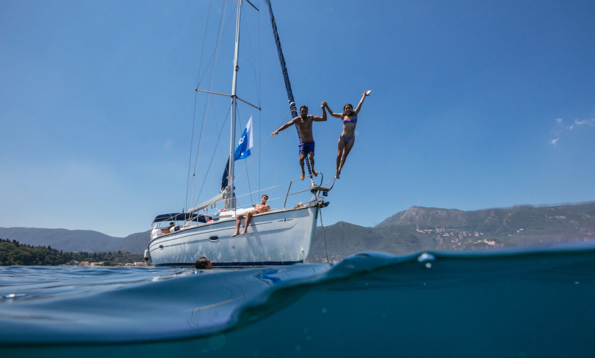 Corfu Greece jumping in ocean off boat