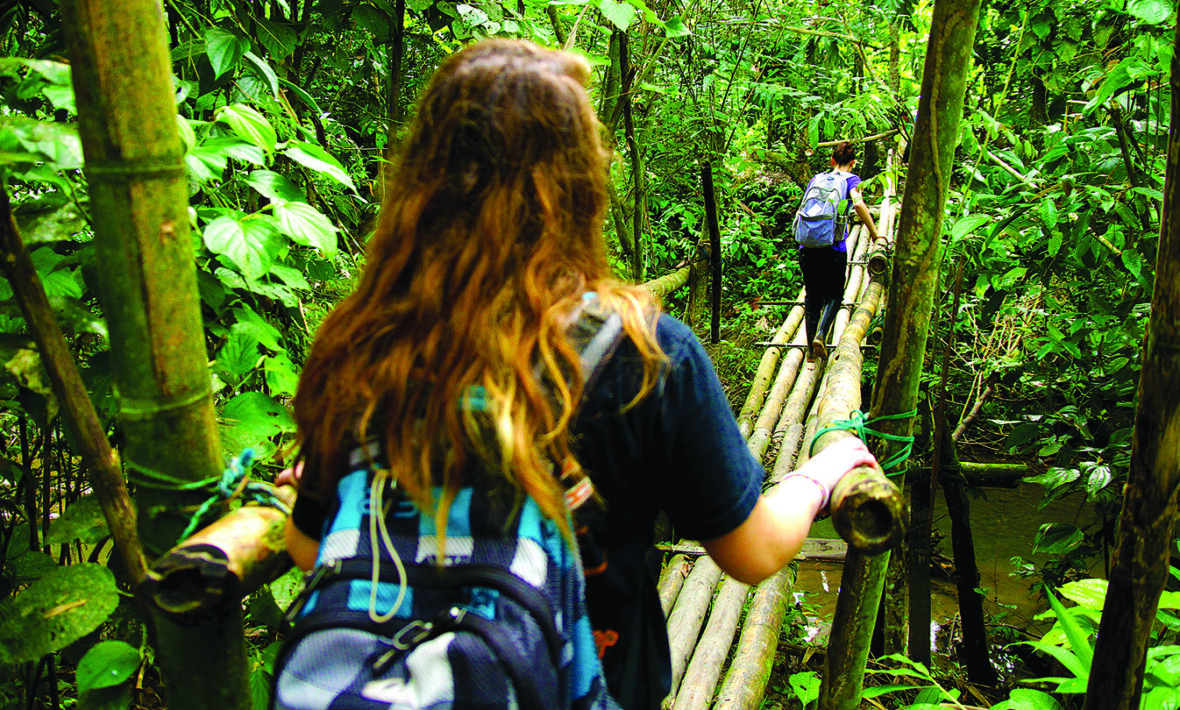 Girl-walking-over-bridge-volunteering