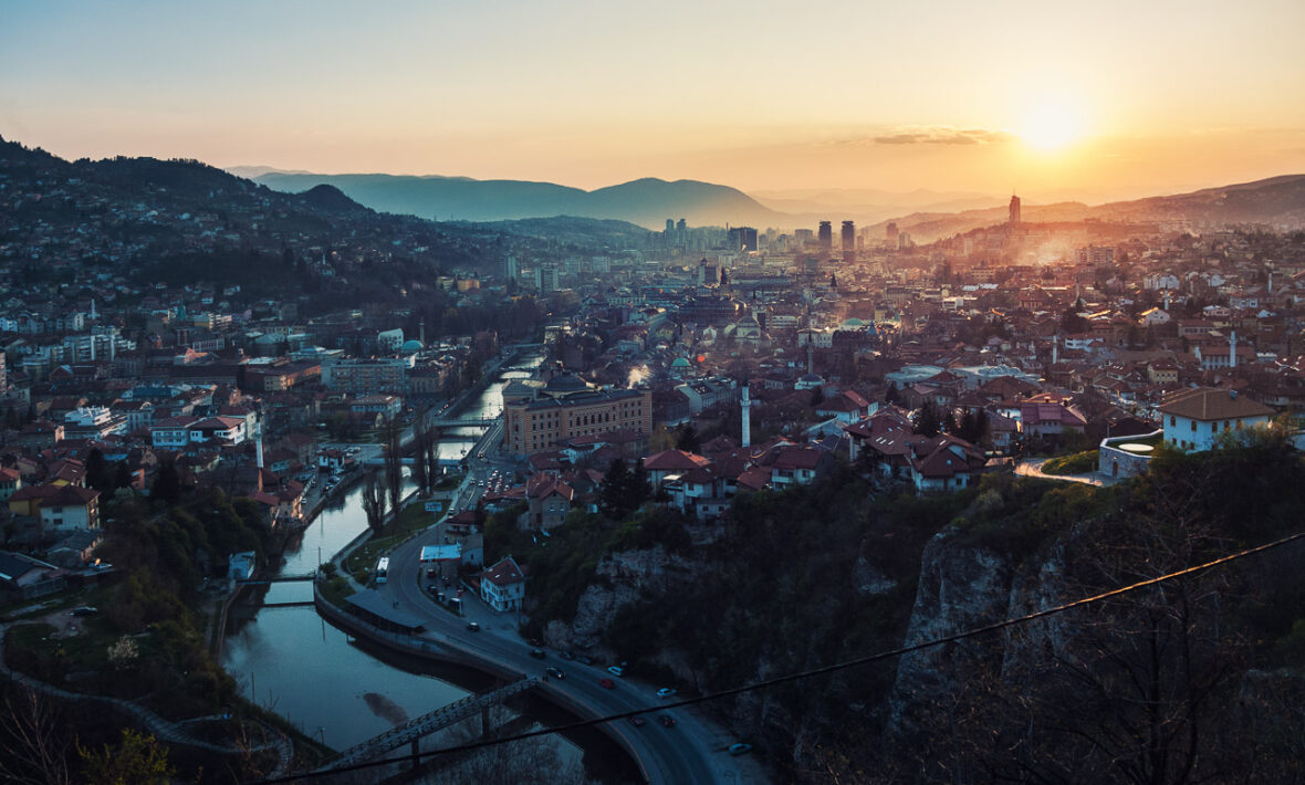 The sun is setting over Sarajevo.