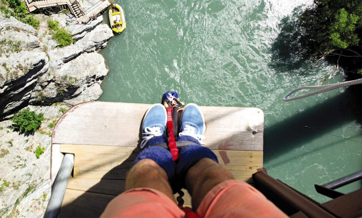 adventure travel - image taken looking down at feet about to bungee jump