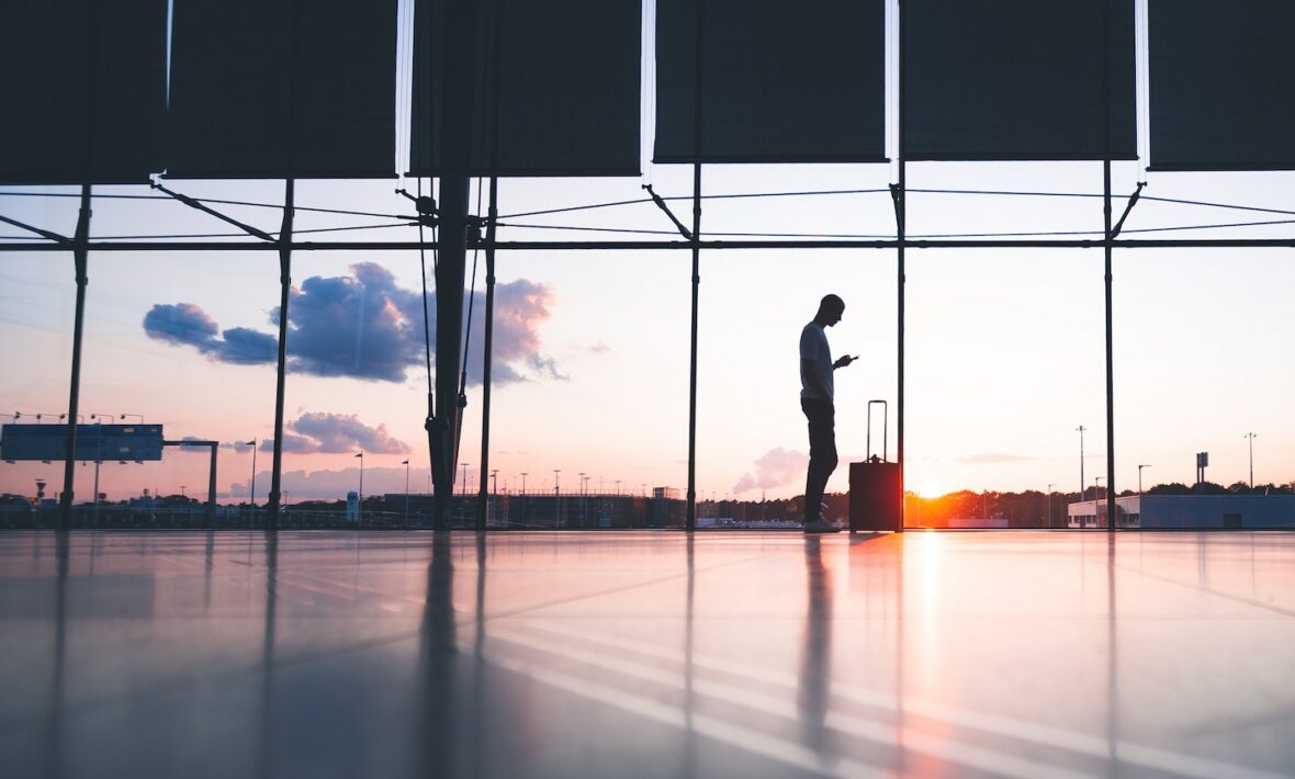 Man waiting for airplane at airport