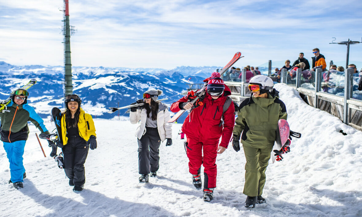 group of happy skiers in hopfgarten, austria