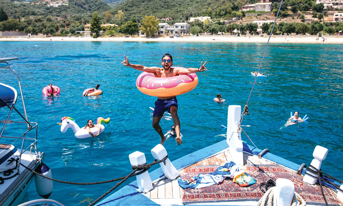 man jumping off george's boat