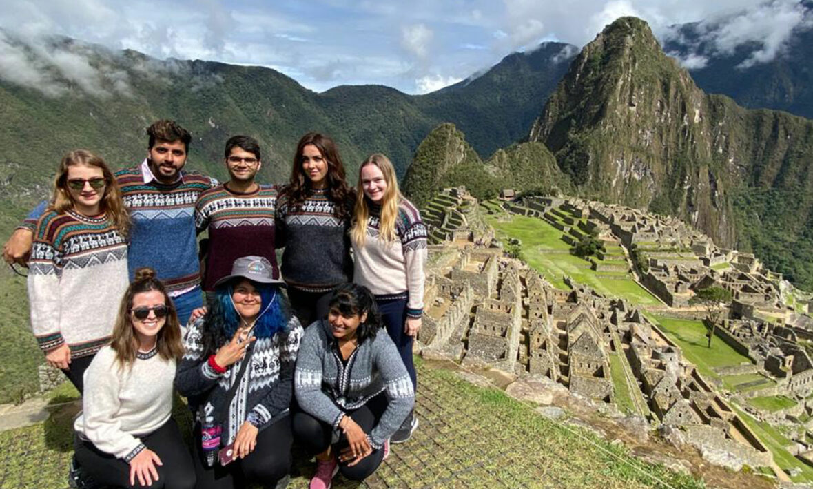 Group of friends on Peru Panorama at Machu Picchu