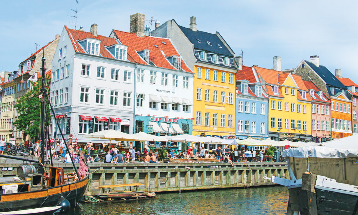 romantic travel destinations - image of colourful houses in copenhagen