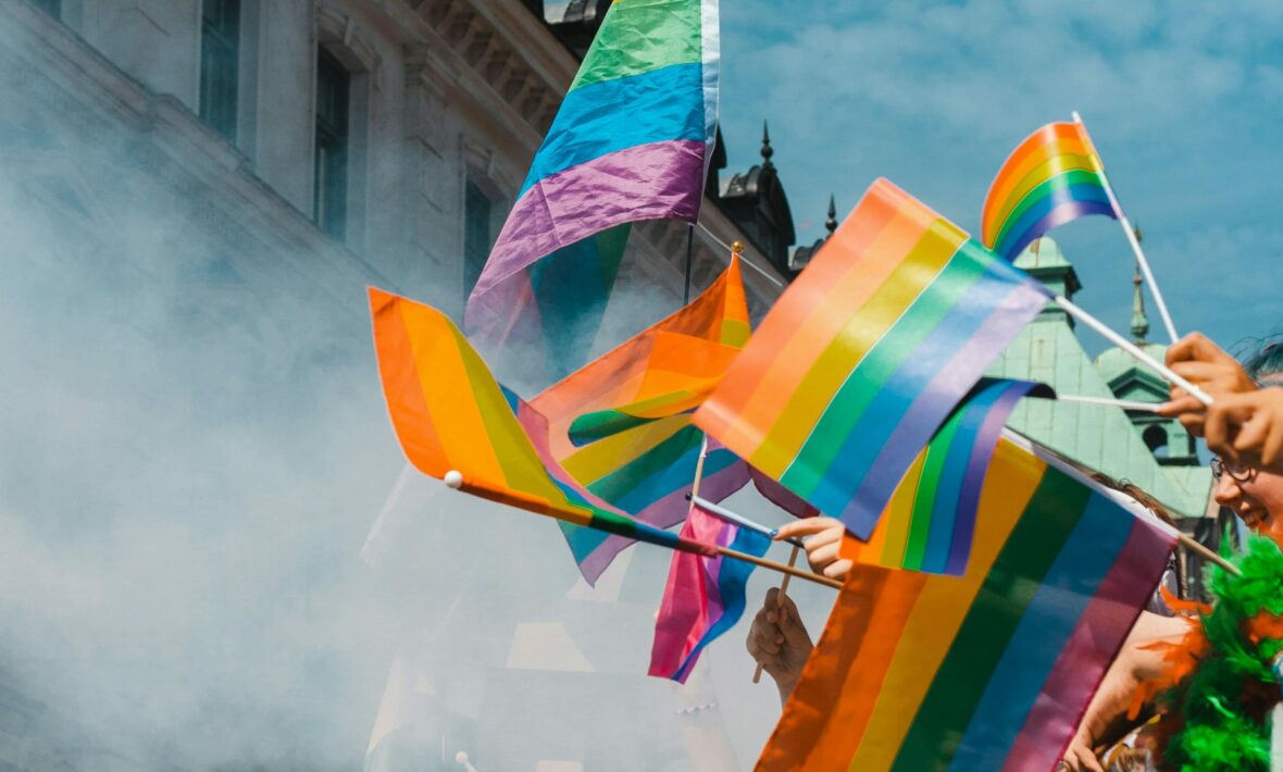 waving flags at a Pride festival