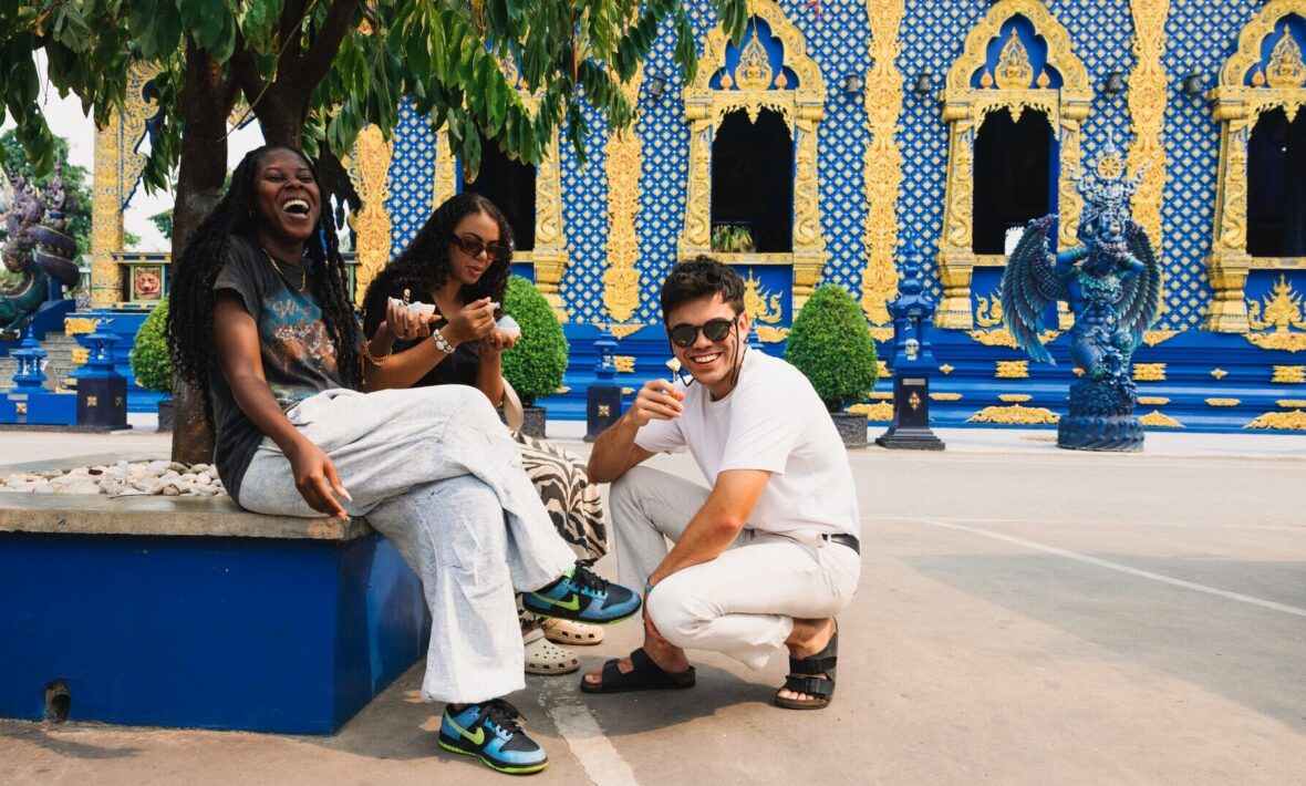 Contiki travellers at a temple in Thailand