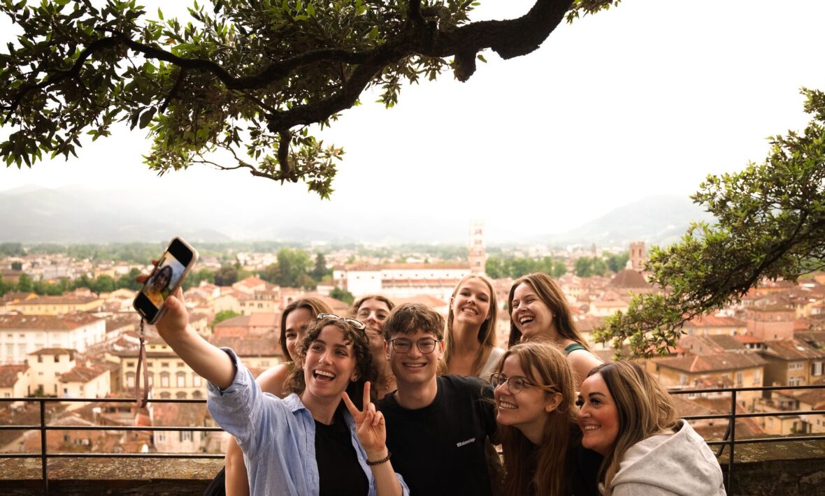 Contiki travellers taking selfie in the Italian countryside